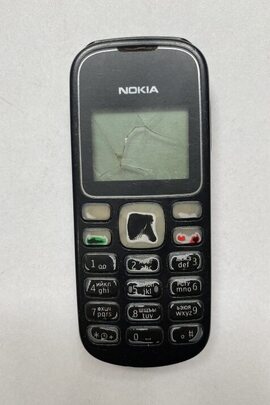 Конфісковане майно за рішенням суду: мобільний телефон Nokia, IMEI: 355943055147310, б/в, чорного кольору, пошкоджений екран