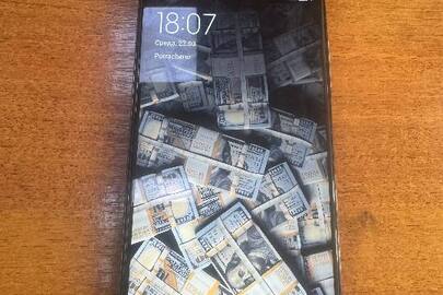 Конфіскація майна за рішенням суду: Мобільний телефон марки "Redmi Note Pro" у чохлі з кольоровою кришкою, б/в