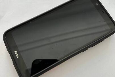 Конфіскація майна за вироком суду: мобільний телефон марки «Redmi 7A» чорного кольору у чохлі червоного кольору, б/в.