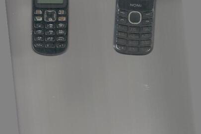 Мобільні телефони «Nokia», модель та імеі видалені, та «Nomi» модель І184 імеі 35303508009141319, бувші у використанні