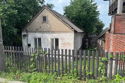 Житловий будинок, загальною площею 67,6 кв.м., реєстраційний номер об'єкта нерухомого майна 2187794223101, за адресою: м. Запоріжжя, вул. Учительська, буд. 57