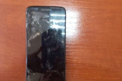 Конфісковане майно за рішенням суду: мобільний телефон марки "Motorola G6" із сім-карткою 0990420155 із імеі1: 359527092100691/44, б/в