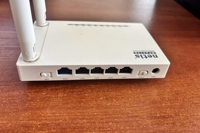 Конфісковане майно за вироком суду: роутер Netis WF2419E б/в