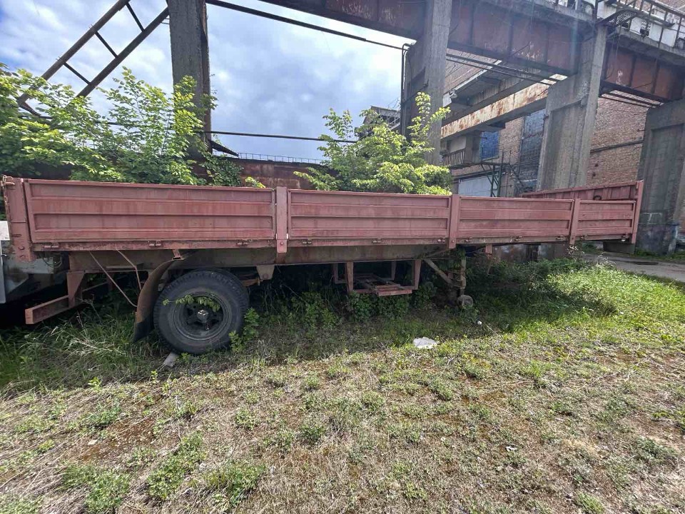 Напівпричіп бортовий- Е, марки БЗТМ УПП- Б- 1510, рік випуску 1995, реєстраційний номер АМ0185ХР, червоного кольору , номер шасі ( кузова, рами) 2810000000020153