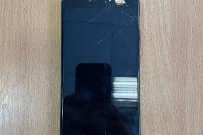 Конфісковане майно за рішенням суду: мобільний телефон марки "S-TELL", моделі P-850, чорного кольору, розбите скло екрану, б/в