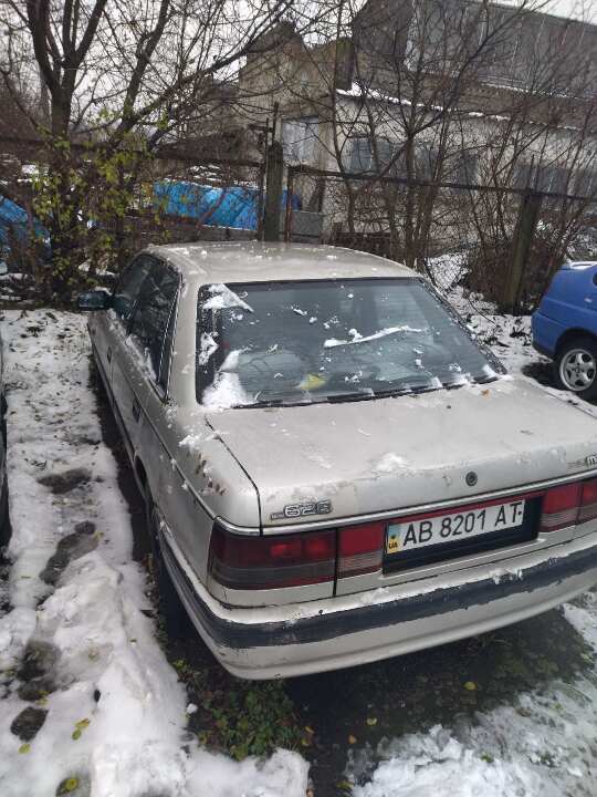 Автомобіль марки MAZDA 626, номер кузова JMZGD121201308096, ДНЗ АВ8201АТ, 1989 року випуску, колір сірий