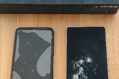 Конфісковане майно за рішенням суду: мобільні телефони: марки «SAMSUNG GALAXY S25 ULTRA»; марки «REDMI Note 12 Pro»; та відеореєстратор TESAR AHD TESCAM HDVR B4CH4A – QHD; б/в