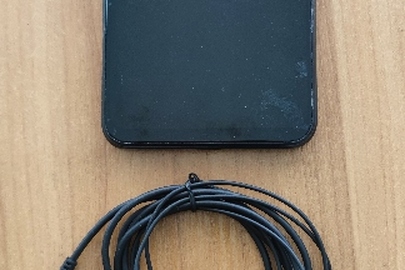 Конфісковане майно за рішенням суду: мобільний телефон марки «Хіaomi» модель Redmi, чорного кольору, із сім - картами мобільного оператора «Lifecell», «Vodafone» та Навушники, б/в