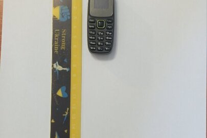 Конфісковане майно за ухвалою суду: мобільний телефон марки "ВМ310 Mini Phone" чорного кольору з зеленими вставками, б/в
