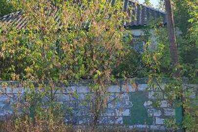 Житловий будинок з надвірними будівлями,загальна площа 88,1 кв.м., житловова площа 49,5 кв.м., за адресою:Харківська область Ізюмський (кол.назва Балаклійський) район, смт. Андріївка вул.(кол.назва Червонодонецька) Донецька  б. 77, реєстраційний № 13091854