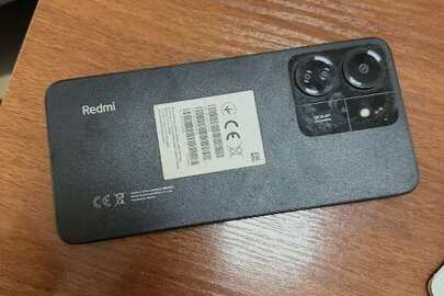Конфісковане майно за рішенням суду: мобільний телефон марки Xiaomi Hyper OS, моделі Redmi 13С, з операційною системою «HyperOS» ІМЕІ (гніздо для SIM-карти ) (основний) 8671198078787847/78 , ICCID (гніздо 1 для SIM-карти) 893800399279660576, б/в