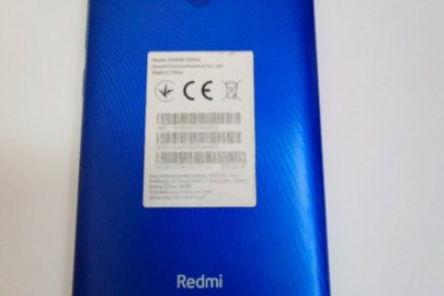 Мобільний телефон Xiaomi Redmi синього кольору, бувший у використанні