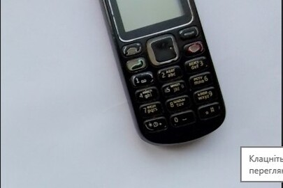 Мобільний телефон NOKIA чорного кольору, бувший у використанні