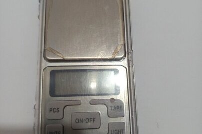 Конфісковане майно за рішенням суду: електронні ваги марки QCPASS 200g, сірого кольору, 1 шт., б/в