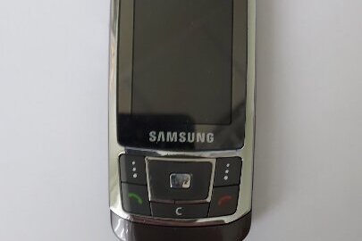 Мобільний телефон марки “Samsung” SGH-D 900і, бувший у використанні