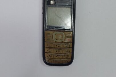 Мобільний телефон марки “Nokia 1200”, бувший у використанні