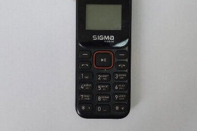 Мобільний телефон марки “SIGMA mobile”, бувший у використанні