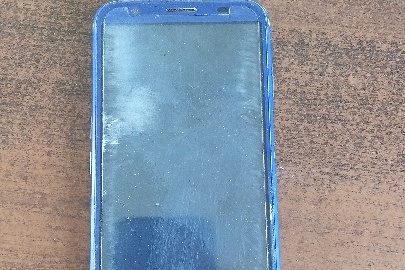 Мобільний телефон марки "DOOGEE",бувший у використанні.