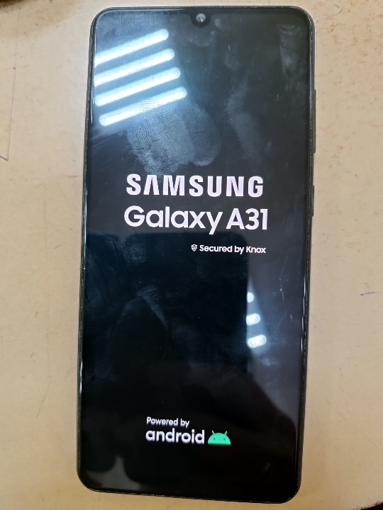 Мобільний телефон Samsung Galaxy A31 чорного кольору з IMEI-1: 356560119138785 та IMEI-2: 356561119138783, стан б/в