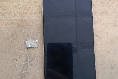Конфіскація майна за рішенням суду: мобільний телефон марки «iPhone 11 Pro Max», модель MWHF2SE/A, серійний номер FK1CF46FN70T, білого кольору, з сім-карткою Lifecell, стан б/в