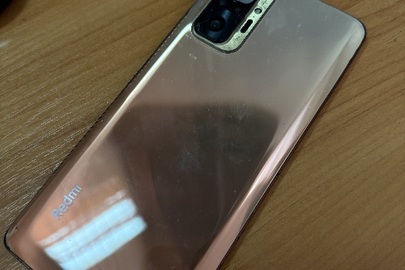 Конфісковане майно за рішенням суду: мобільний телефон марки REDMI Note 10 Pro, у кольорі Gradient Bronze, б/в