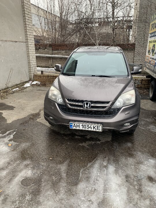 Легковий автомобіль: HONDA, CR-V, сірого кольору, 2011 року виготовлення, ДНЗ: АН 1034 КЕ, VIN № SHSRE7870BU003723