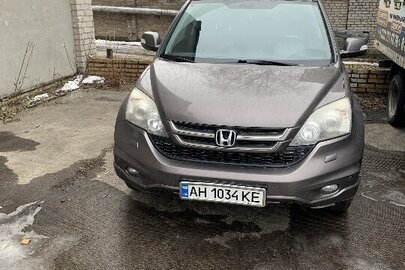 Легковий автомобіль: HONDA, CR-V, сірого кольору, 2011 року виготовлення, ДНЗ: АН 1034 КЕ, VIN № SHSRE7870BU003723