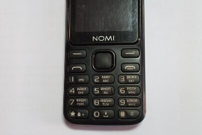 Конфісковане майно за рішенням суду: мобільний телефон марки NOMI, модель i240, б/в