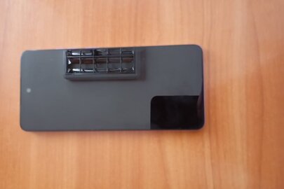 Конфісковане майно за рішенням суду: мобільний телефон марки MOTOROLA, модель Е14, б/в