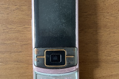 Конфісковане майно за рішенням суду: мобільний телефон, марки "Samsung C3050"  б/в