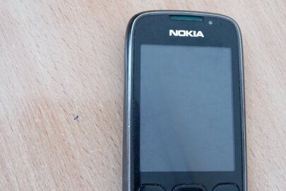  Мобільний телефон марки NOKIA-6303 сі (ІМЕІ 357394048758615, з сімкарткою оператора мобільного зв'язку ПрАТ "ВФ Україна"  , б/в