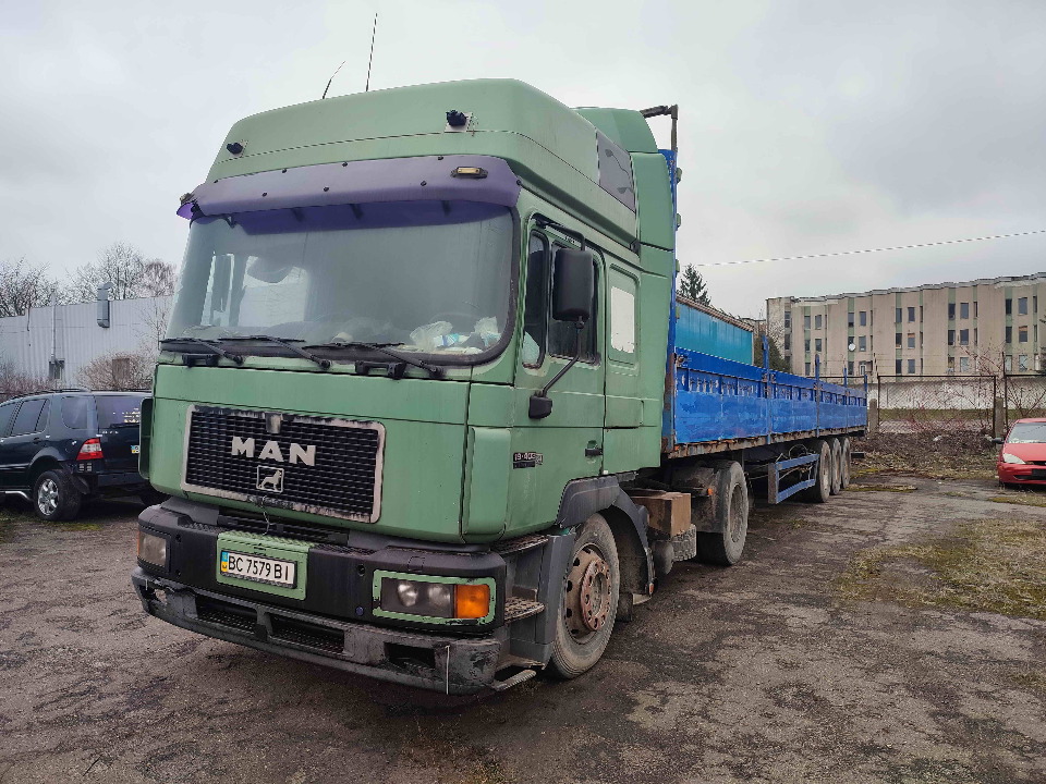 Колісний транспортний засіб: сідловий тягач-вантажний марки MAN модель 19.403 FLS/N, рік випуску - 1998, реєстраційний номер BC7579BI, номер шасі WMAT32M462M243052, колір зелений