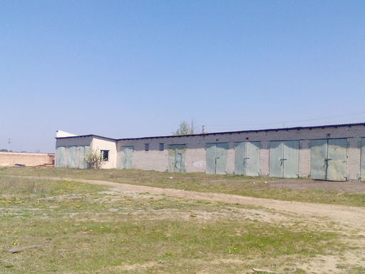 Будівля автогаражу, загальна площа: 923.1 кв.м., місцезнаходження майна: Рівненська область, Березнівський район, с. Губків, вул. Шевченка, 1а