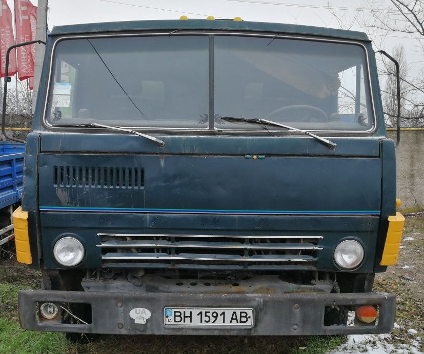 Транспортний засіб тягач бортовий  