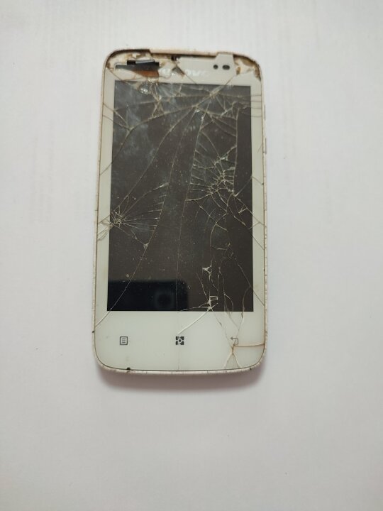 Мобільний телефон марки «LENOVO» А-390, IMEI – стертий, без батареї та задньої кришки, білого кольору, б/в