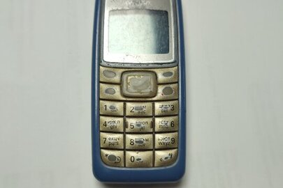Мобільний телефон марки «Nokia», IMEI - 35463005055322, біло-синього кольору, б/в