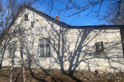 Житловий будинок, загальна площа - 95,4 кв. м. та земельна ділянка кадастровий номер 0724585000:04:001:0052, площа 0,25 га, за адресою Волинська обл., Луцький (колишній Рожищенський) р., с.Забара, вул. Набережна, 4а