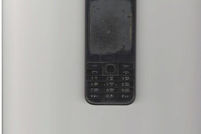 Мобільний телефон марки "Nokia" моделі "RM-1011" в корпусі чорного кольору, з сім карткою +380635748451, б/в