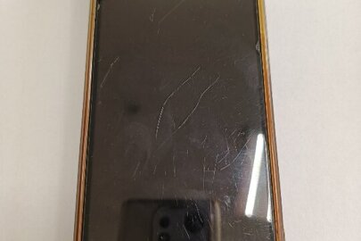 Конфіскація майна за увалою суду:мобільний телефон марки Redmi, IMEI: 864565041577278/02, IMEI: 864565044077276/02, з сім - карткою, б/в