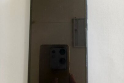Конфісковане майно за рішення суду:мобільний телефон марки "REDMI 9" з сім-картою +380969654973, б/в 