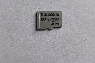 Конфісковане майно за рішенням суду:картка пам'яті формату microSD "Transcend" 128 Gb, б/в