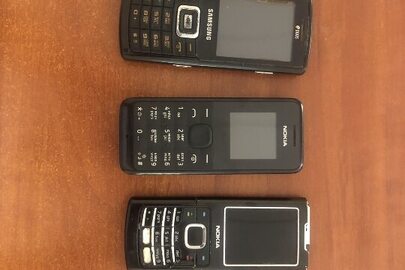 Мобільні телефони: «Нокіа» з сім-картою, «Самсунг» моделі «GTC5212i», «Самсунг» моделі «GT7070», «Самсунг» моделі «GT8500», «Нокіа» моделі «6500с», Пластикова картка до сім-карти оператора мобільного зв'язку ПрАТ «Астеліт» №0631376617"