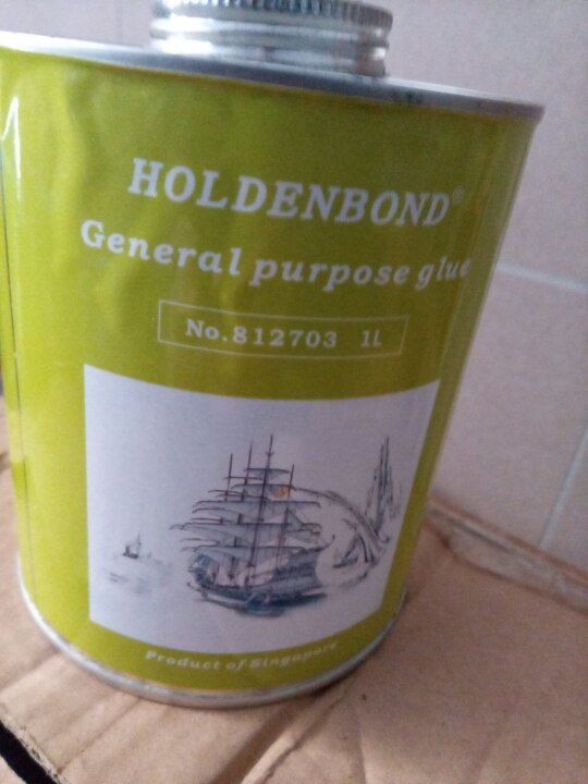 Клеюча рідина (клей) для резини з маркуванням «Holdenbond» 1 банка ємністю 1 літр,  без ознак використання