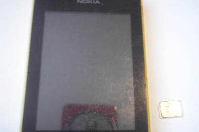 Мобільний телефон "Nokia RM934", ІМЕІ1: 351747/06/480456/1, ІМЕІ2: 351747/06/480459/9, акумуляторна батарея та сім-картка невідомого оператора