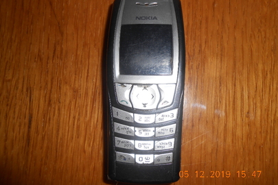 Мобільний телефон марки "NOKIA-6610", ІМЕІ: 356228/00/788953/5 та акумуляторна батарея до нього, б/в
