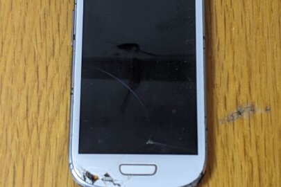 Конфіскація майна за рішенням суду: мобільний телефон марки "Samsung" моделі "GT - 18200N ", б/в