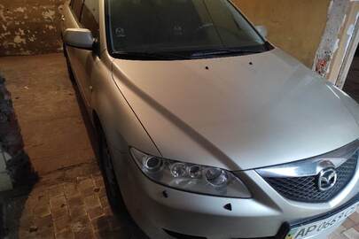 Легковий сєдан Mazda модель 6, державний номер АР0669СЕ, 2003 року випуску, сірого кольору, кузов №JMZGG12F241183679
