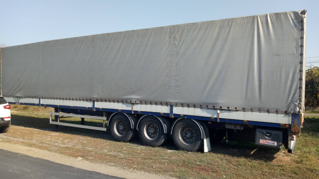Напівпричіп бортовий марки TRAILOR, 2002 року випуску, ДНЗ АО 6536 ХХ, рама № VFNTX34CW22EX0839, синього кольору
