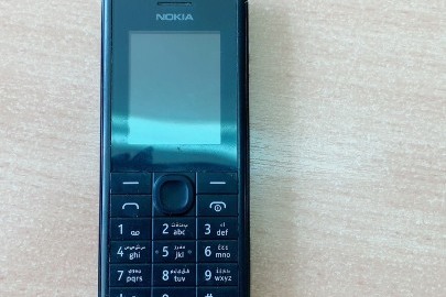 Мобільний телефон марки NOKIA, модель RM-969 з акумуляторною батареєю