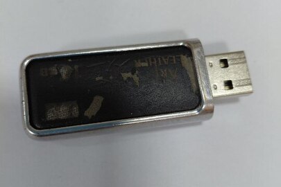 Конфіскація за рішенням суду: флеш накопичувач торгівельної марки "Аrt Leather", стан б/в